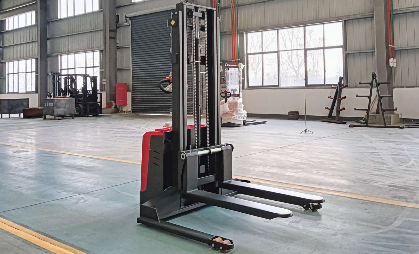 High-capacity electric stacker with durable forks for heavy loads.