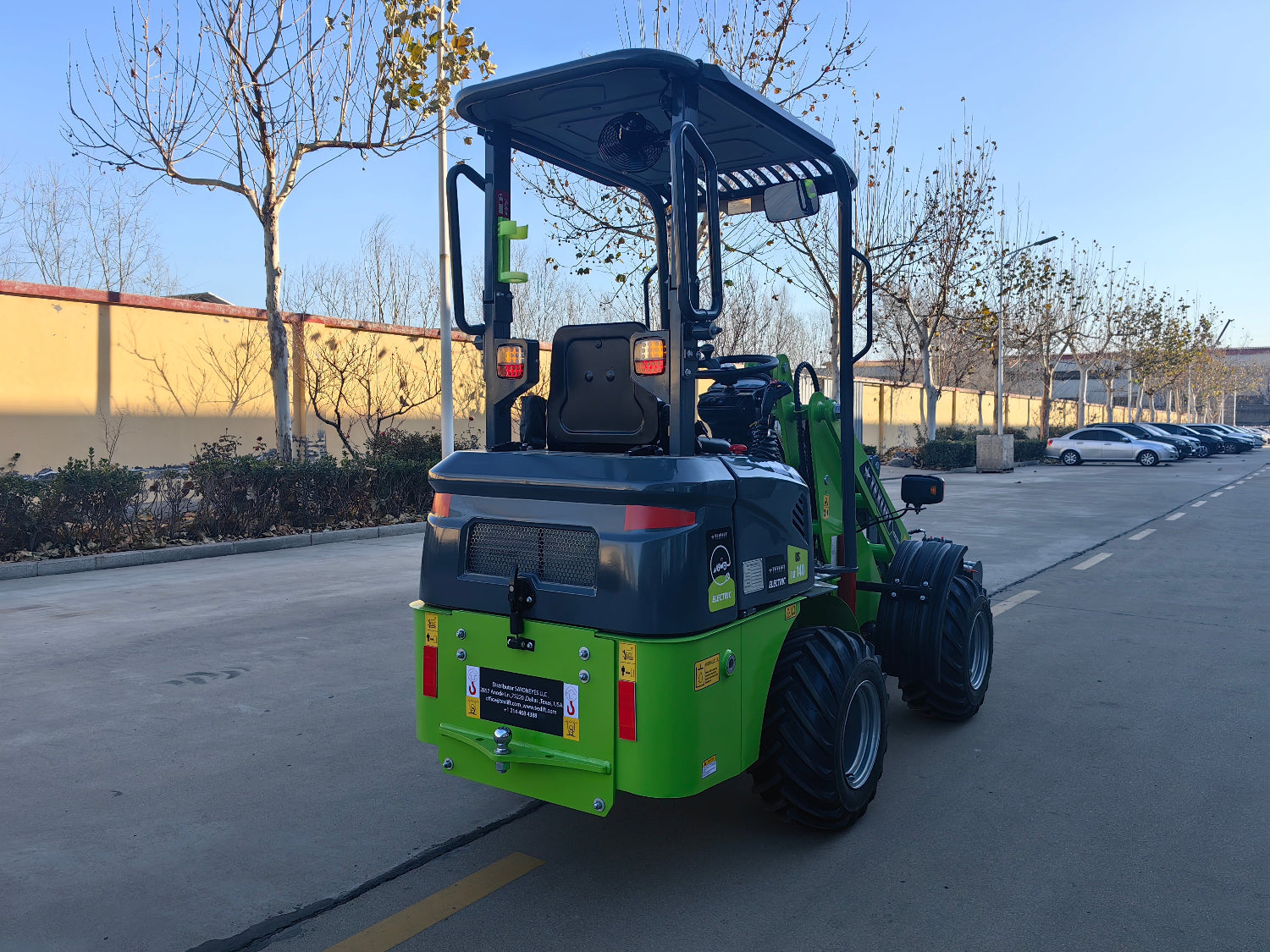 Texlift Electric Loader in operation, showcasing its compact design, powerful lifting capabilities, and user-friendly controls.