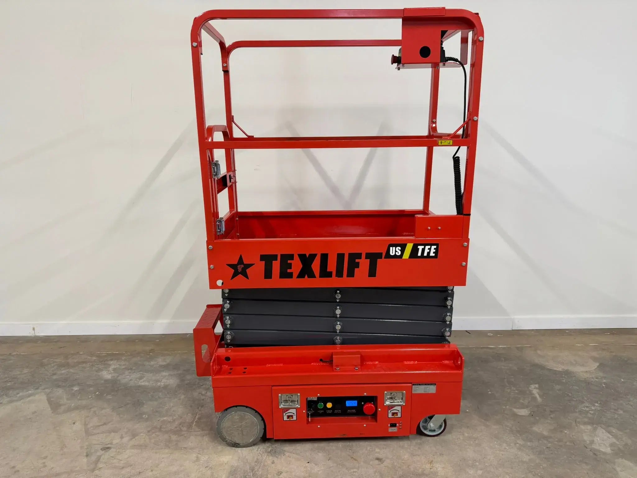 Electric scissor lift with high platform height, large load capacity, and energy-efficient operation for construction and maintenance tasks.