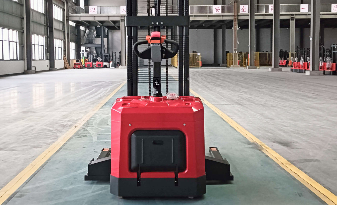 High-capacity electric stacker with durable forks for heavy loads.