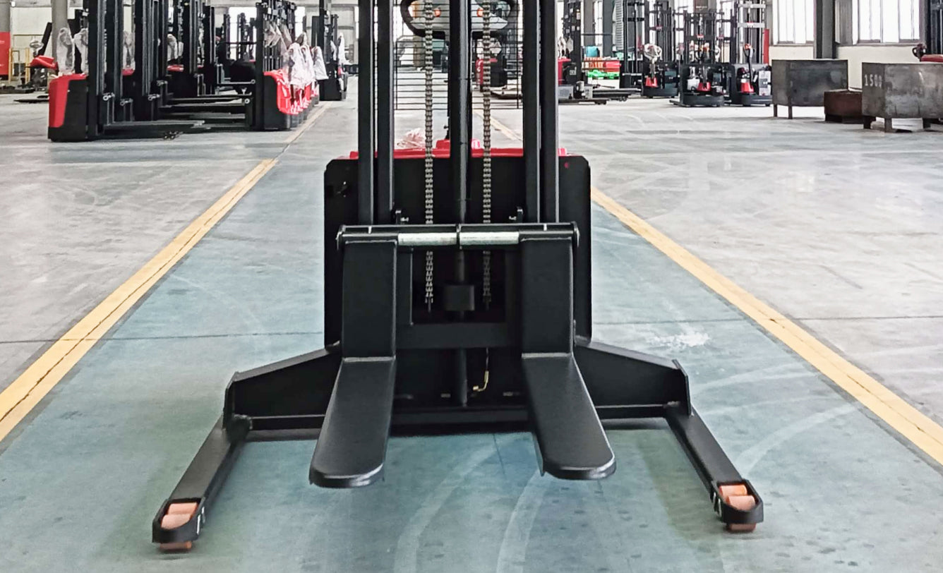 High-capacity electric stacker with durable forks for heavy loads.