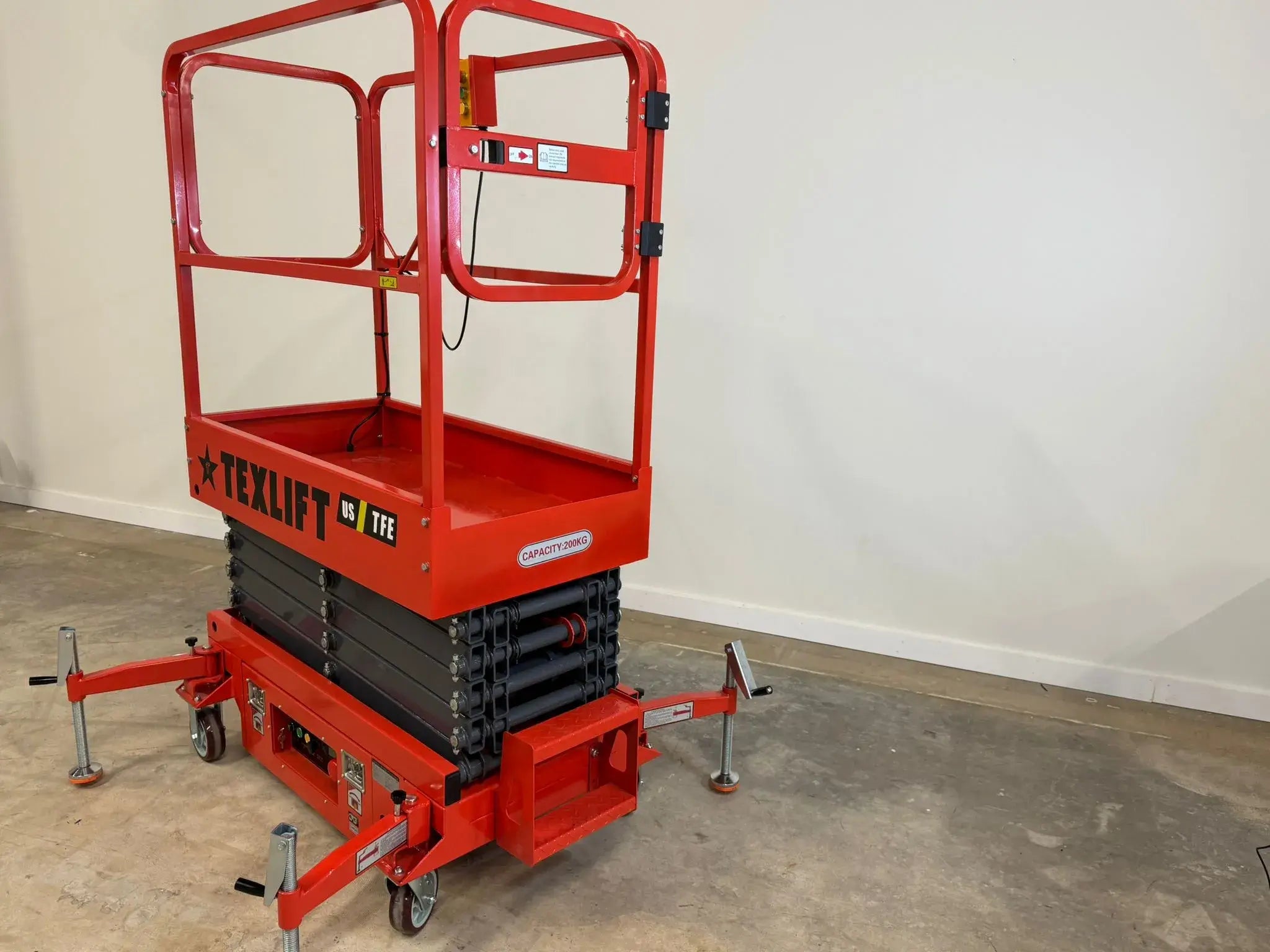 Texlift Semi-Electric Scissor Lift with 185-inch platform height, 440 lbs capacity, compact design, and durable construction for elevated tasks.