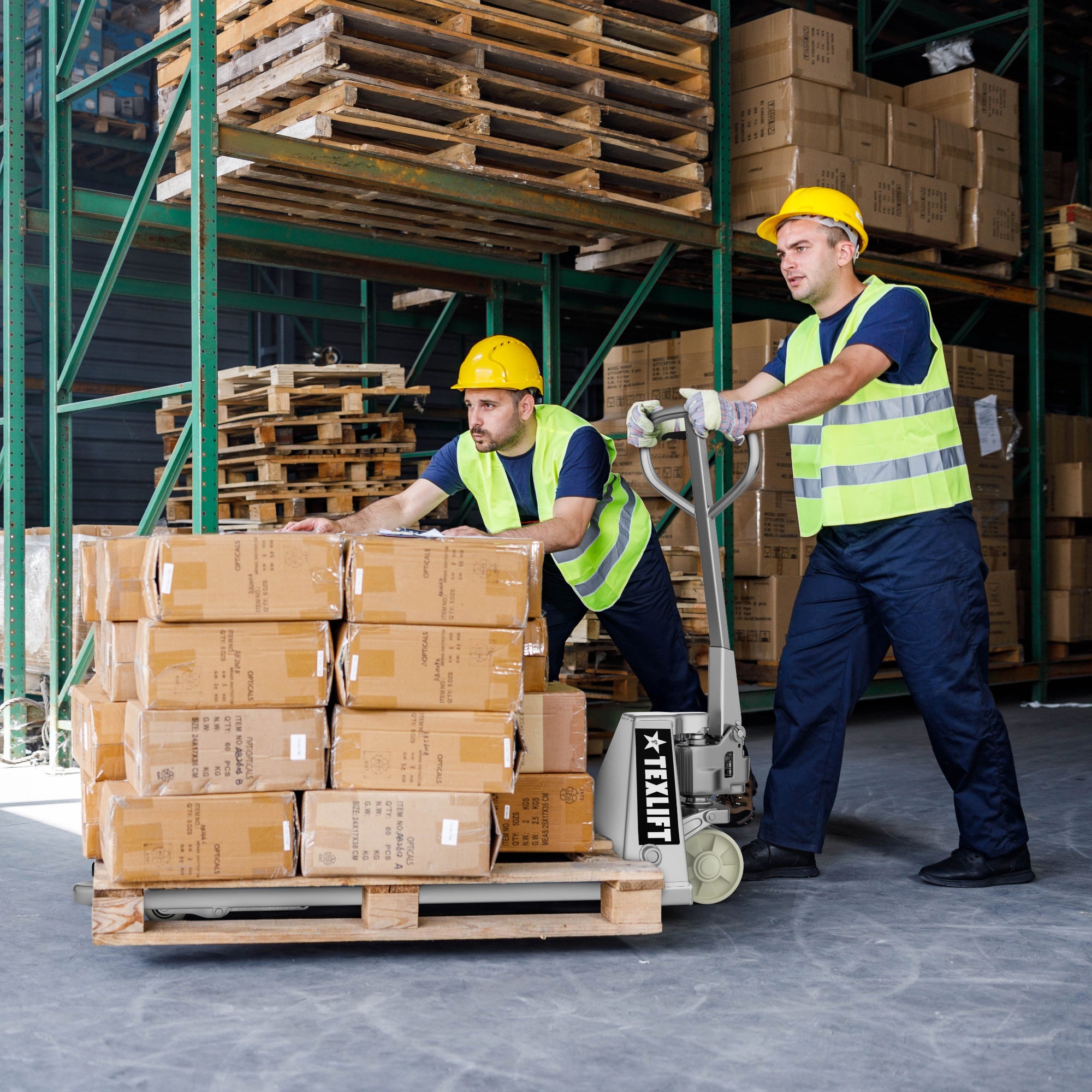 Two workers in a warehouse with pallets and boxes